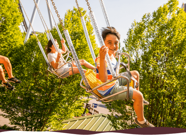 Boy riding Wave Swinger at Hersheypark